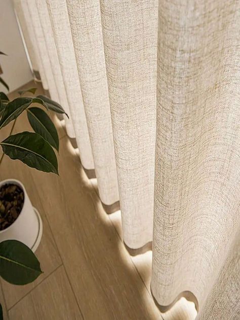 Cortina de linho forma wave com luz passando levemente destacando a textura do tecido